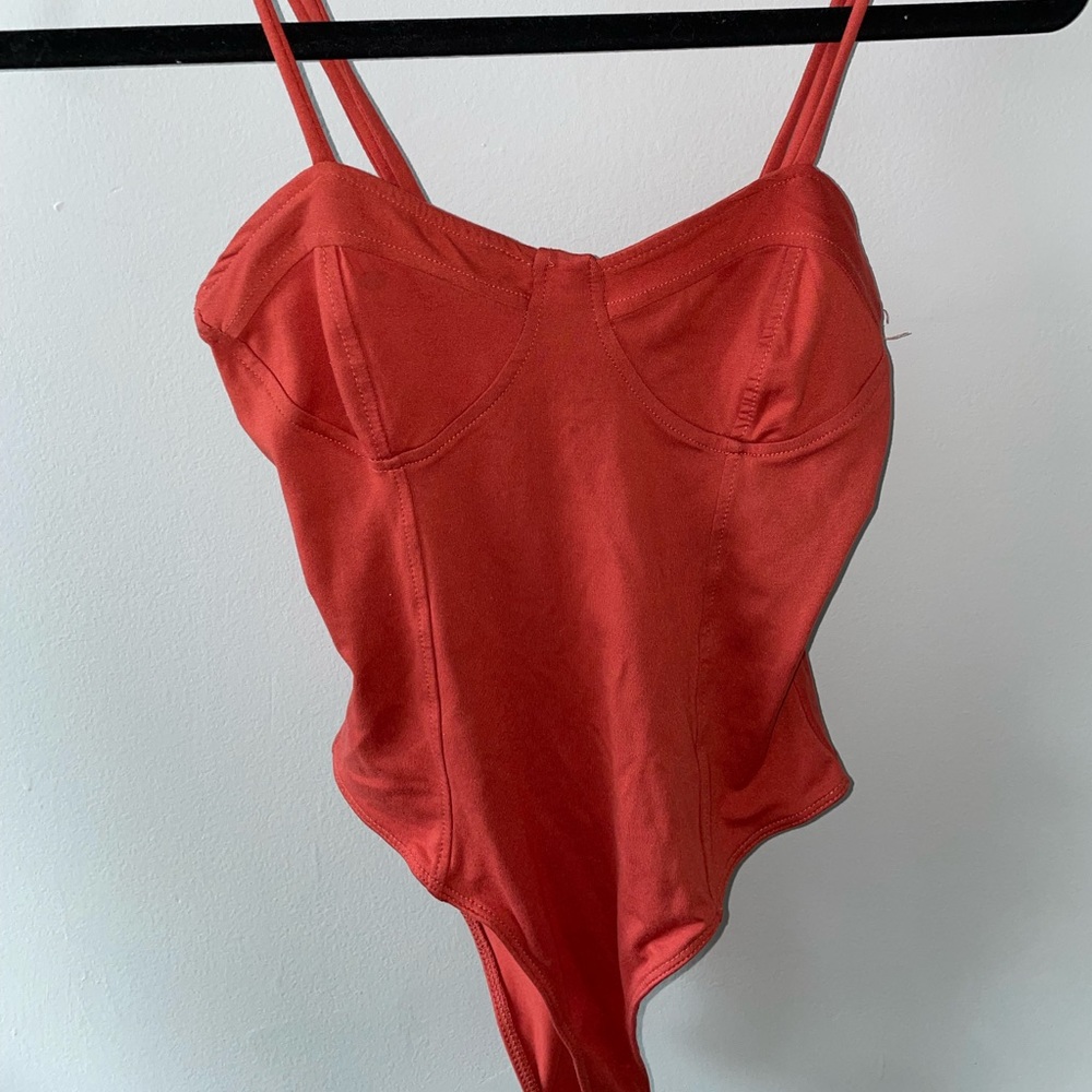 Burnt orange bodysuit